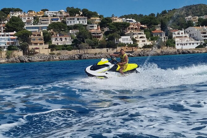 60 minutes Jetski Rental in Alcudia Bay - Cruising coves and caves: the guided ride rhythm