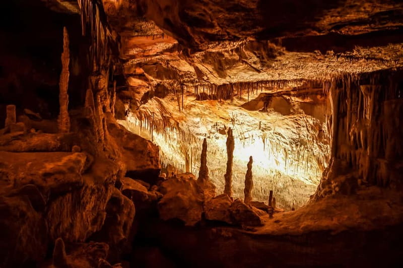 Alcudia: Caves of Drach Tour from the North with Boat Trip - The Optional Wooden Boat Ride Across Lake Martel (When It’s Available)