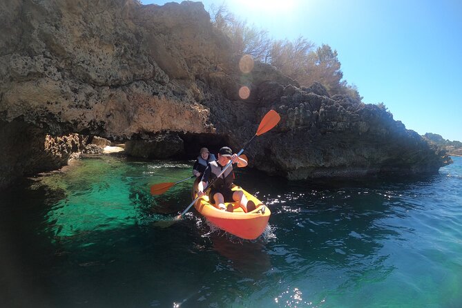 Alcudia: Guided Sea Kayaking & snorkelling Tour (day & sunset) - Stop 1: the sea-cave experience and the guide-held lights