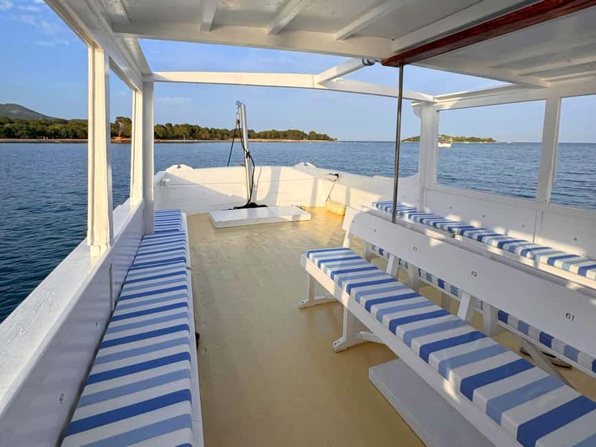 Alcudia Mallorca: Boat Trip with Food, Snorkeling, and SUP - The first stop off the cliffs: swim and snorkel for real