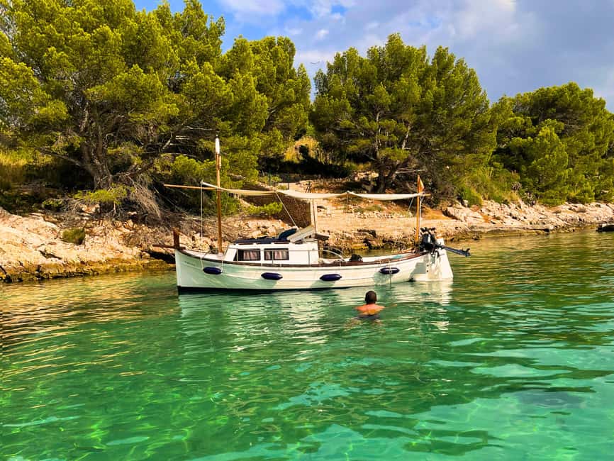 Alcudia & Pollensa Private Boat Tour, Captain, Fuel, Snorkel - Far de Punta de l’Avançada: snorkeling plus a food tasting break