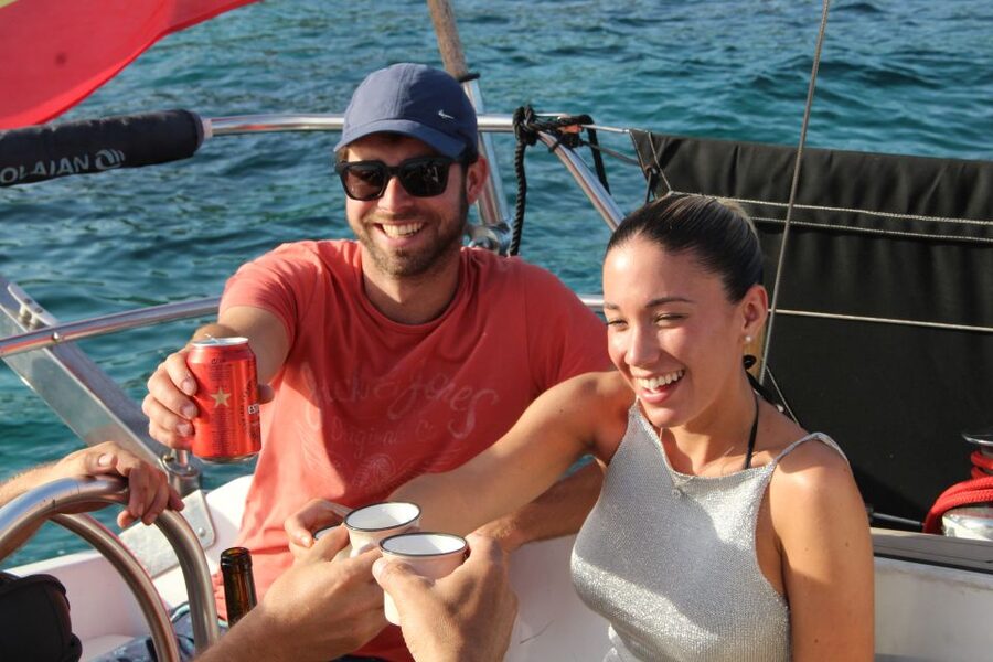 Alcudia: Private Sunset Boat Trip with Glass of Wine & Snack - The anchor stop: snorkel, swim, and use the paddle board