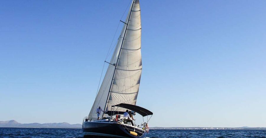 Alcudia: Sailing Yacht Excursion with Wine & Tapas - Taking the wheel: the moment that makes it feel personal