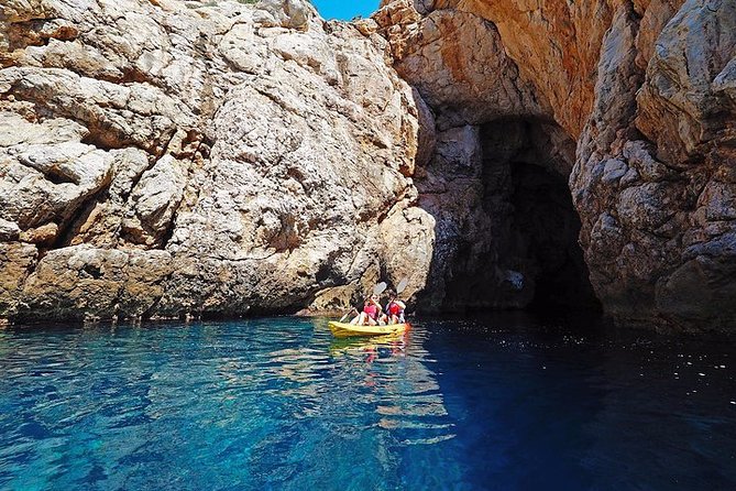 Breathtaking guided Kayak tour from Sant Elm the bay of Cala en Tió - Cala en Tió break time: swimming, snorkel, and how the bay feels