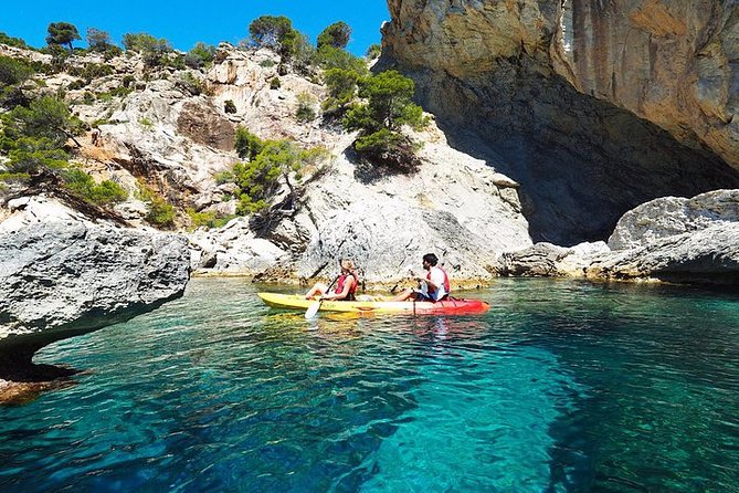 Breathtaking guided Kayak tour from Sant Elm the bay of Cala en Tió - Small-group feel: what the “up to 16” setup means on the water