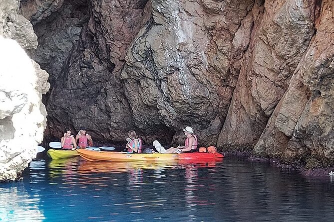 Breathtaking guided Kayak tour from Sant Elm the bay of Cala en Tió - What to bring for sun, sea, and rocky moments