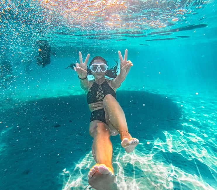 Can Picafort: 2-Hour Boat Tour with Snorkeling & Sea Caves - Snorkeling Gear, Paddle Board, and Life Jackets: Your Water Setup