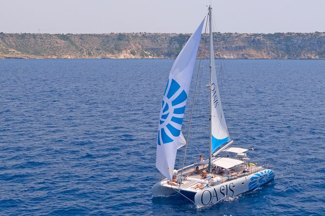 Catamaran sailing at sunset with tapas Palma de Mallorca - Should you book Oasis Catamaran’s sunset tapas cruise?