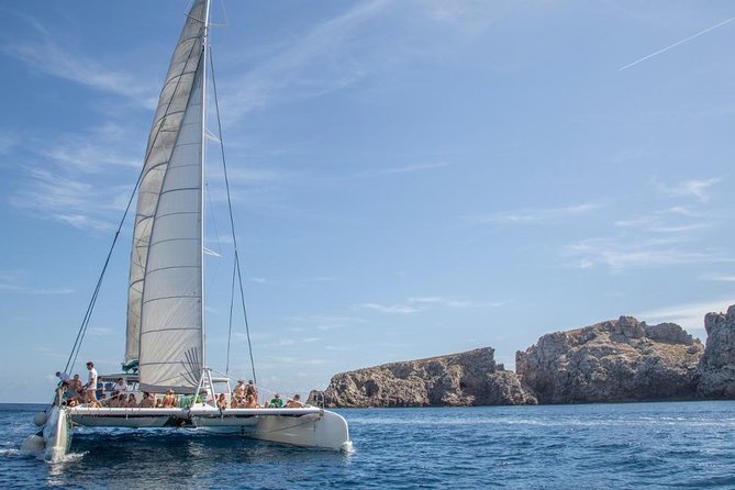 Day Catamaran Trip: Cap des Freus and Llevant Natural Park - Anchor stops for swimming and snorkeling in clear water
