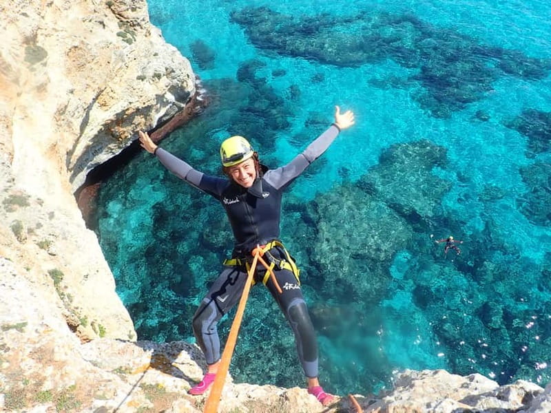 Estany d'en Mas: Coastal Hike, Abseil & Sea Cave Exploration - Suit up: wetsuit, shoes, harness, and the gear that makes it feel safe