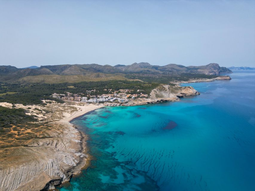 Experinence Cala Agulla / Molto with Paddlesurf and snorkel - Water Activities: Paddleboarding, Snorkeling, Cliff Jumps, And Caves