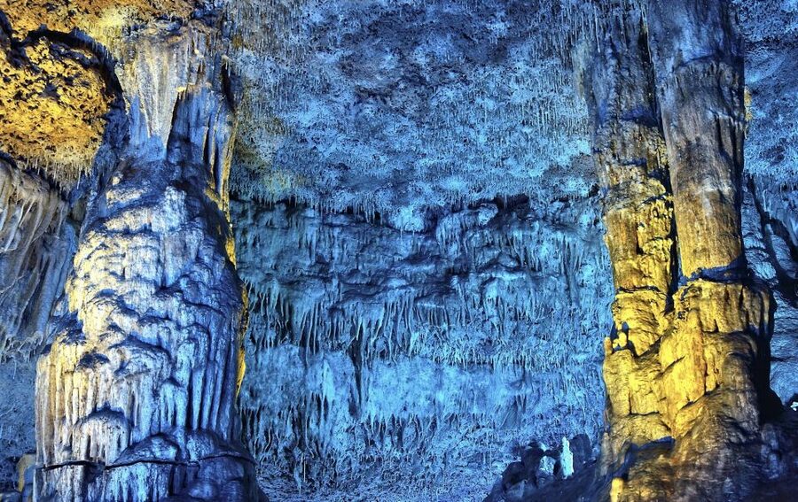 From Alcúdia: Dinosaurland and Hams' Caves Half-Day Trip - Cuevas dels Hams: stalactites, an underground lake, and the 3D Sea of Venice show