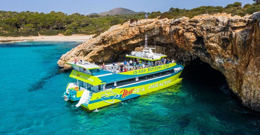 From Calas de Mallorca: Scenic Glass Bottom Boat Tour - What You’ll See on the Way Out: Pirate Cave and White-Sand Beaches