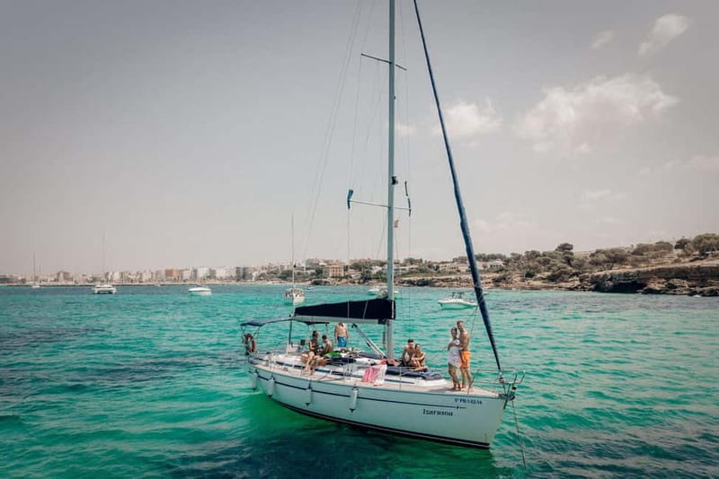 From can Pastilla : Sailing boat trip with Food & Drinks - Cala Blava swim stop: snorkeling and paddle surf in a 30-minute burst