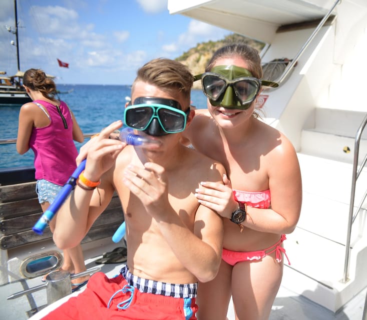 From Paguera: Dolphin Watching Cruise in a Glass-Bottom Boat - Swim Stop in a Cove: Refreshing Time, Not a Snorkel Fantasy