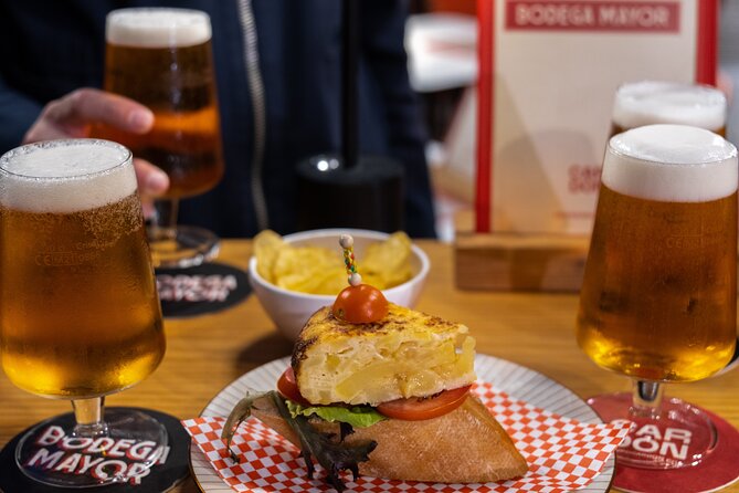Gourmet Tapas and Wine Tour in Palma de Mallorca - Plaça de la Reina and the Cathedral Area Finish