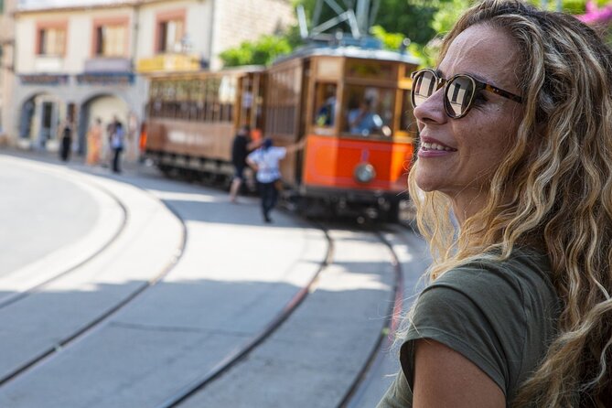 Island Tour with Train Tram Boat and Bus from Cala Millor - Cala Millor to the Mountains: Expect the Long Coach Stretch
