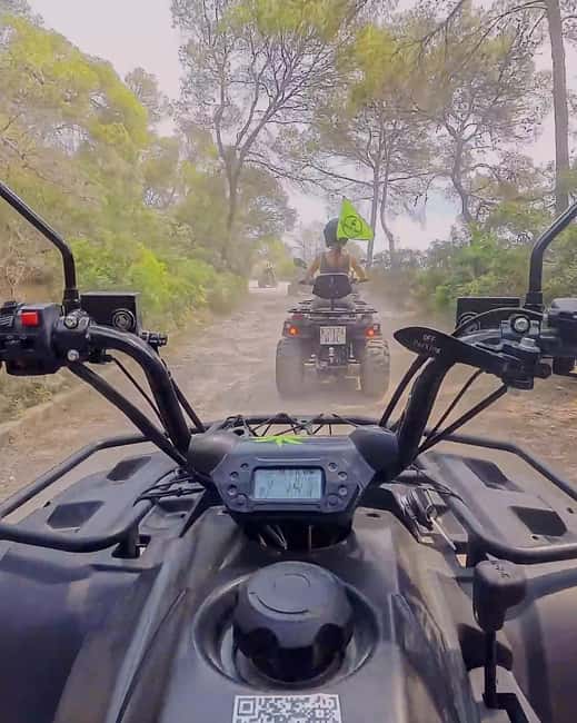 Magaluf: Quad bike tour through the mountains, visiting caves, coves, and cliffs - Cala Vinyes Pass-By: Quick Glimpse, Still Part of the Story