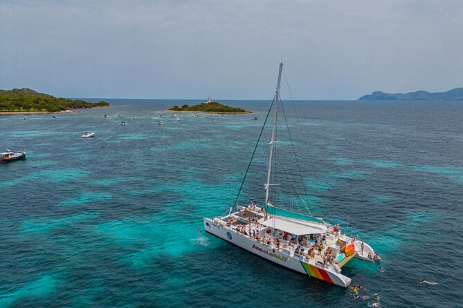 Mallorca Catamaran Cruise with Scenic Views and BBQ Lunch - Snorkels, kayaks, and paddle boards: the onboard “free time” that matters