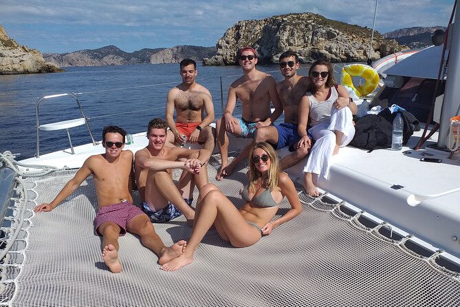 Mallorca Catamaran Small Group Cruise with Tapas 4-hours - Snorkeling, Seascooters, SUP Boards, and Float Time