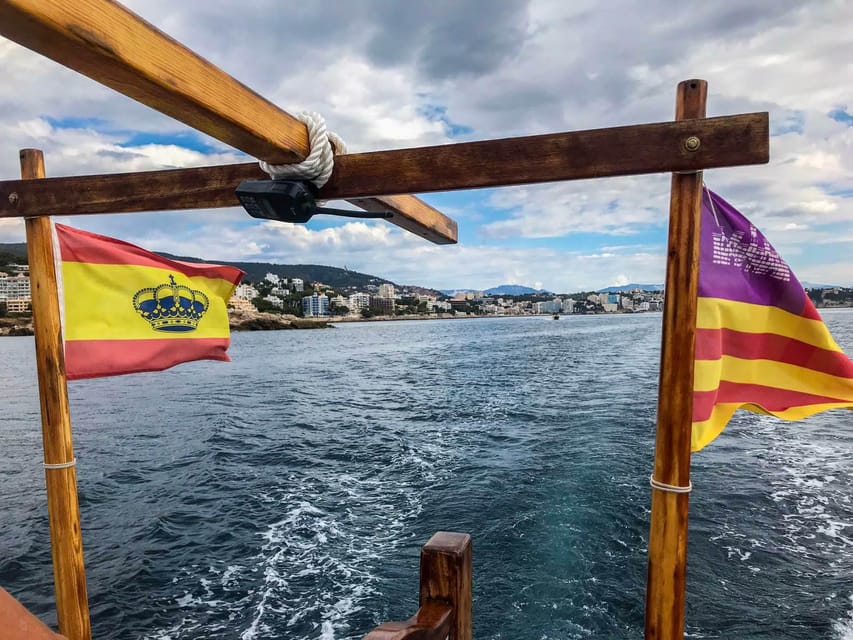 Mallorca: Llaüt Excursion around Palma with food and drinks - Stop 1: Cala Comtesa for paddle SUP and fish spotting