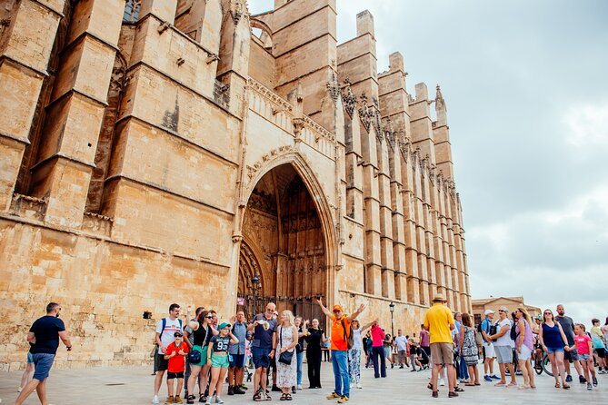 Mallorca Old Town Walking Tour with Cathedral Skip The Line Tour - Roman walls and Almudaina Palace views: short walk, big payoff