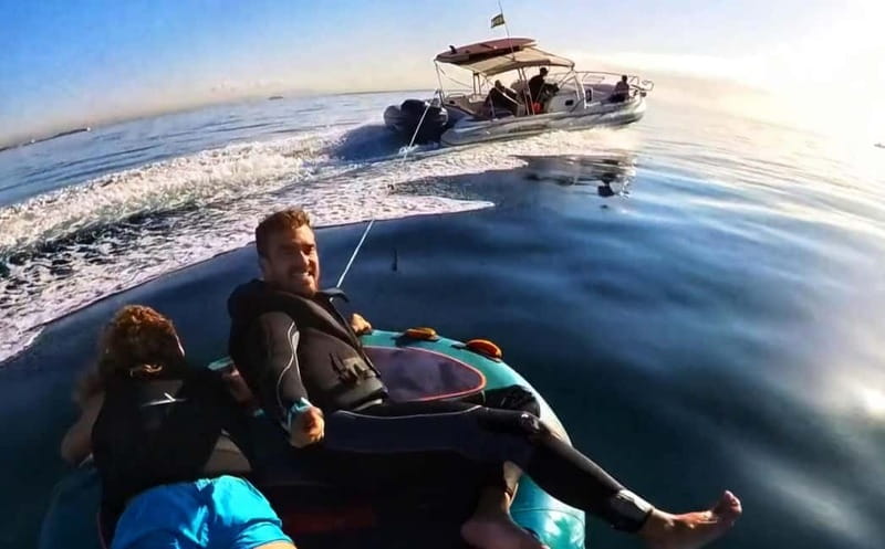 Mallorca: Private Watersports Boat. LUNCH Drinks SUP, Tubing - What’s included (and what that means once you’re on the water)