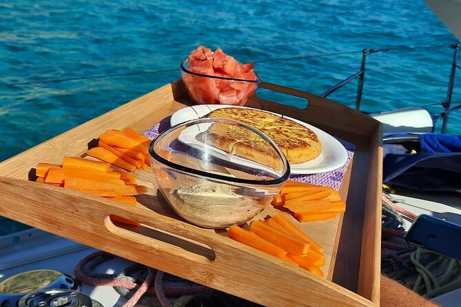 Mallorca Sailing Adventure with Snorkeling, Snacks & Drinks - What’s Included Onboard: Snacks, Drinks, Snorkeling Gear, and Paddleboards