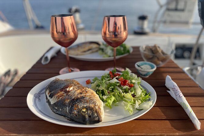 Mallorca sailing tour with tapas and wine - Dolphins, steering, and other moments that make it feel personal
