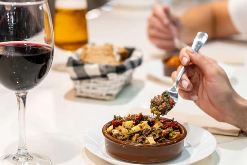 Palma de Mallorca: Traditional Mallorcan Food Tour - Mercado del Olivar and Los Maños: savory tapas with real choices