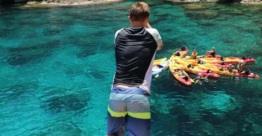 Pollença: Kayak and Coasteering Cliff Jumping - Kayaking from Cala Molins to Cala Sant Vicenç: the calm start before the chaos