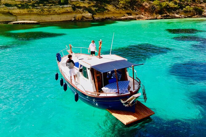 Private Charter Boat Tour in Mallorca - Stop 2: Playa del Mago in Palma Bay for protected, easy swimming