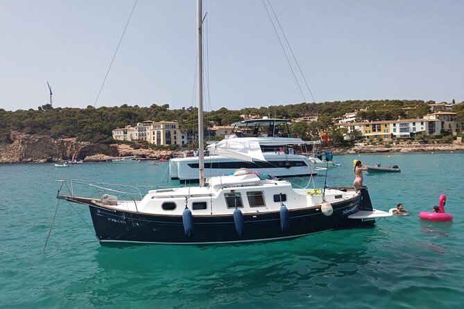 Sail boat day charter tour mallorca yacht llaut tradicional boat - Palma Bay Swim Stops: Crystal Water, Quick History Notes, and Real Breaks