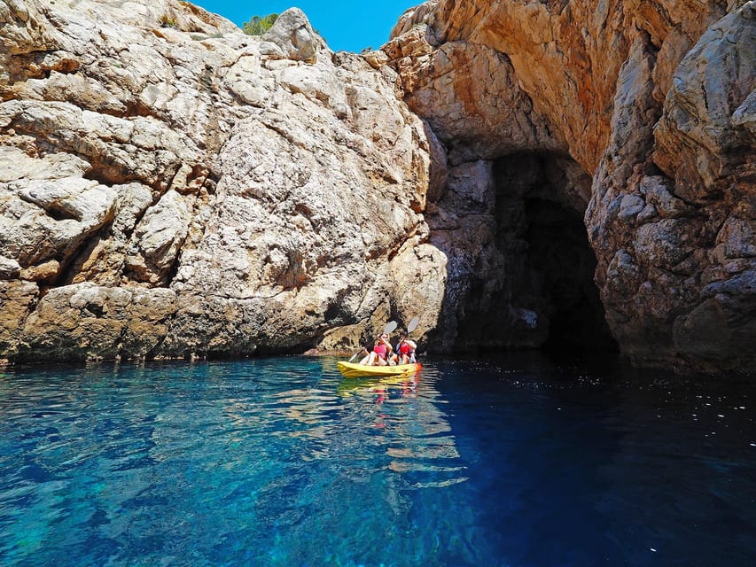 Sant Elm: Guided kayak tour to Cala en Tío with caves - Entering The Sant Elm Launch: Easy Start, Real Safety