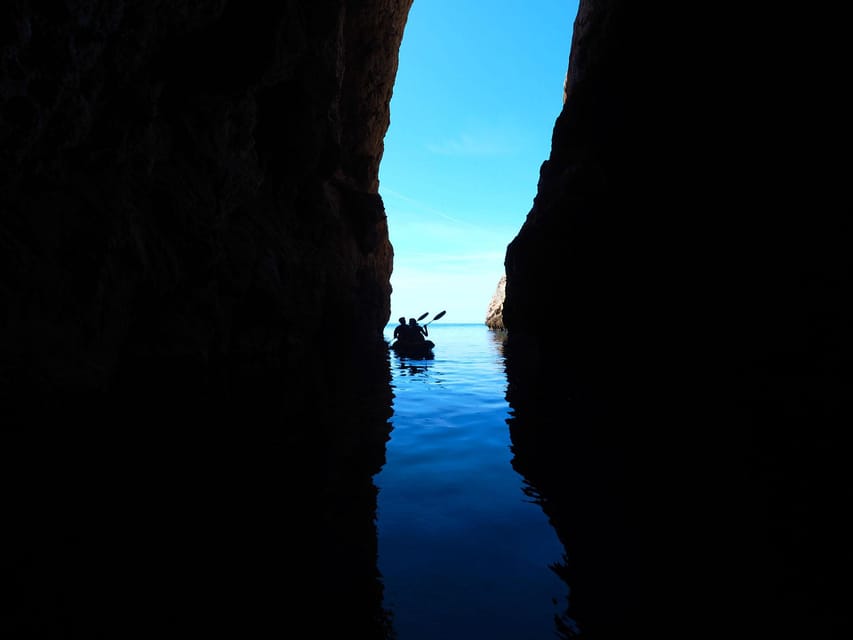 Sant Elm: Guided kayak tour to Cala en Tío with caves - Cala en Tió Break: Swimming and Snorkeling in Clear Water