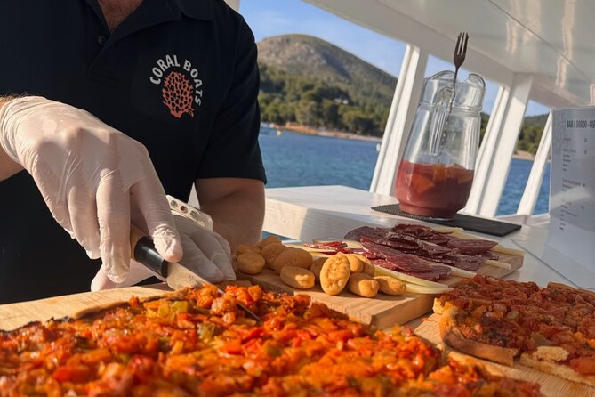 Sunset Cruise in Alcudia with Tapas & Swimming - Tapas and Homemade Sangria as the Sun Drops