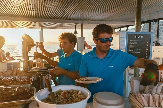 Sunset Sailing Catamaran with BBQ along the Coasts of Mallorca - Sunset, music, and hammocks: your photo plan
